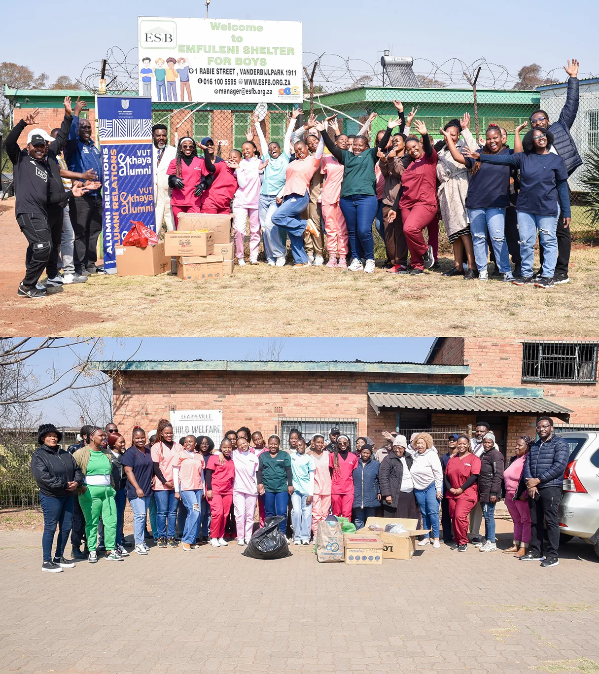 Group of volunteers posing with donated boxes and bags outside a shelter during a charity drive, smiles and raising hands on a sunny day near a banner sign.