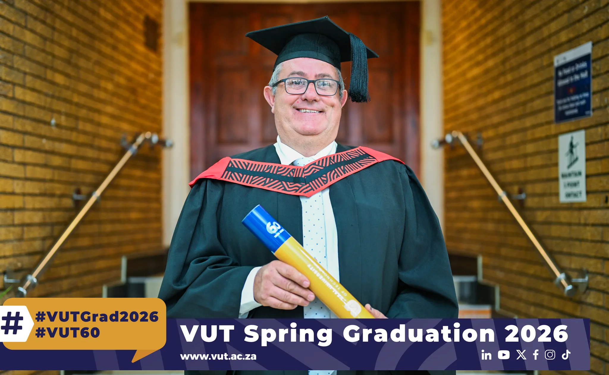 Mr Andries Stefanus du Toit, 56, proudly graduates with a Postgraduate Diploma in Higher Education, proving that lifelong learning knows no age.